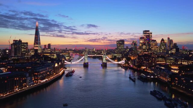 London Skyline Aerial Flythrough Over River Thames Towards Tower Bridge at Sunset