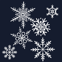White snowflakes on dark blue background winter wonderland scene