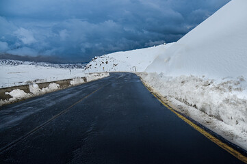 Road leading to Valle Nevado in Chile with dramatic sky