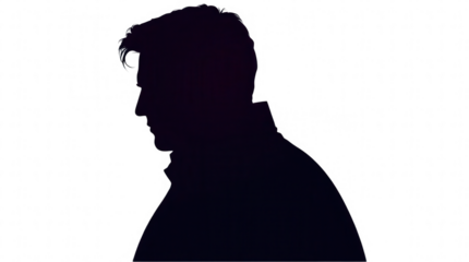 A man in profile is captured as a dark silhouette showcasing his hairstyle and jacket while standing against a bright background during the evening hours