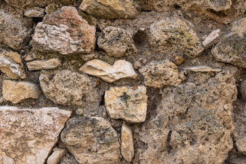 Rough cut stone wall on a farm.