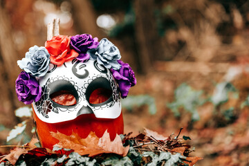 Day of the Dead Background.Pumpkin with Floral Mask for Day of the Dead. Sugar Skull Decoration...