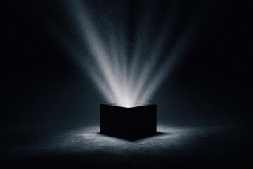 A black box bathed in ethereal light