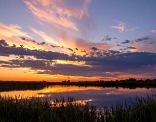 Obraz premium Serene sunset over a calm lake