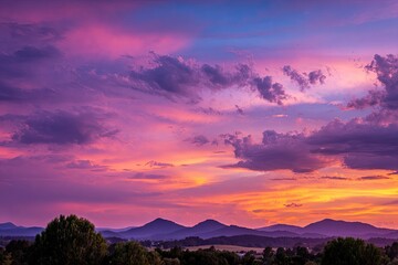 Vibrant sunset over rolling hills