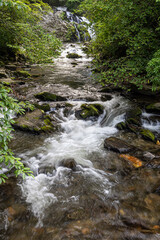 Photo of a beautiful waterfall and stream in the Nantahala Valley in the mountains of North Carolina