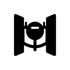 A black silhouette of a round object with a line inside connected to two vertical rectangles on each side