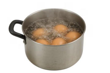 Eggs boiling in a pot with transparent background