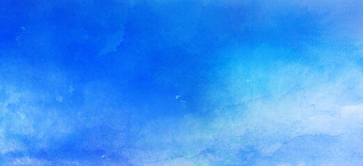 コピースペースのある冬をイメージした青色の水彩背景　背景イラスト　テクスチャ素材