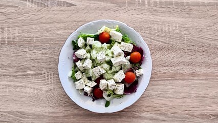 Delicious and Fresh Vegetable Salad made with Feta Cheese and Cherry Tomatoes for everyone