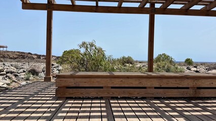 A Beautiful Scenic Wooden Pavilion Perfectly Positioned Overlooking a Stunning Rocky Landscape