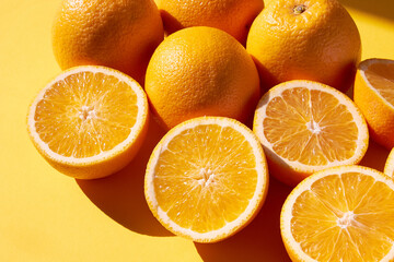 Orange fruits on a orange back