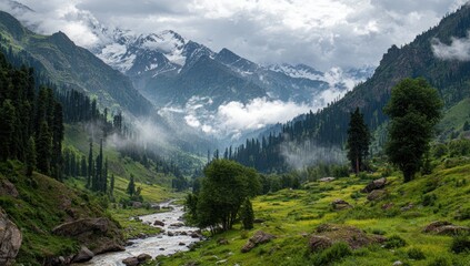 Fototapeta premium Misty valley nestled amongst towering snow-capped mountains. Lush green vegetation and a babbling river wind through the scene