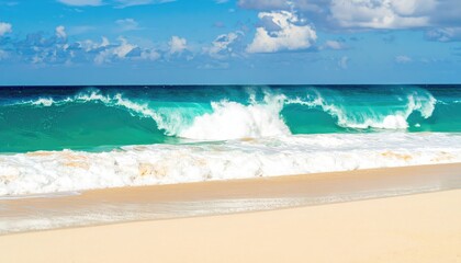 Turquoise ocean waves crash on a pristine sandy beach under a bright blue sky.