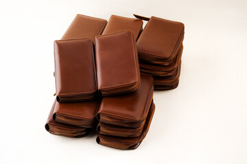 Elegant brown multipurpose leather wallet isolated on white background, perfect for leather product catalog design