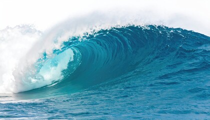 A powerful ocean wave crashes against the sea.