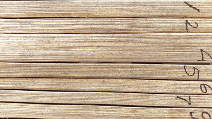 Weathered bamboo wall with horizontal texture and aged patina, ideal for design elements,...