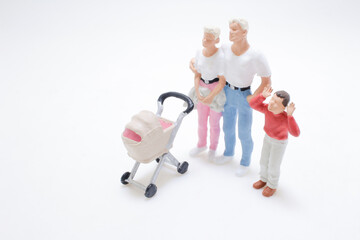 Miniature Figurines of Family with Stroller and Child