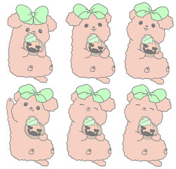 Toy poodle holding a Halloween cookie