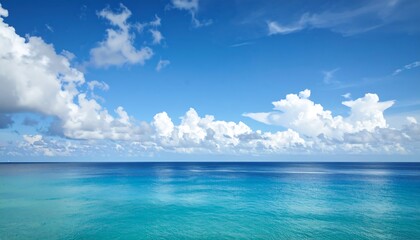Obraz premium Azure ocean, fluffy clouds, vibrant sky