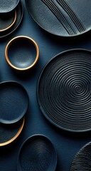Dark navy blue and gold dinnerware, flat lay