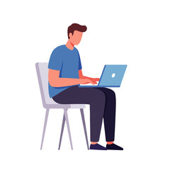 A man sits on a chair and works on a laptop, focused on the screen, typing with both hands.