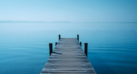 Peaceful Wooden Pier Extending into Serene Blue Water