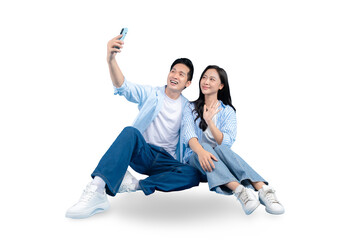 A couple taking a selfie, smiling, and looking happy on PNG background
