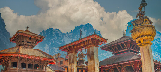 Old wooden buildings of Kathmandu city against the backdrop of mountains. Nepal
