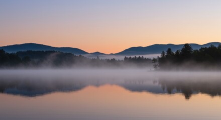 Tranquil Morning Mist Over Mountain Lake