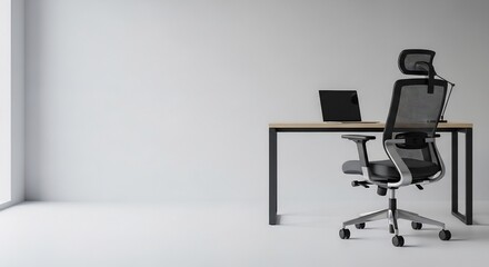 Office chair and laptop on a desk in an empty modern room