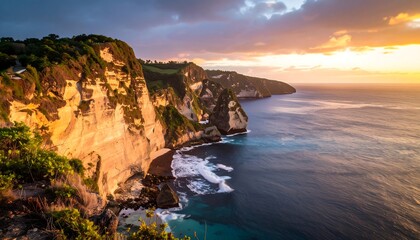 Spectacular coastal cliffs illuminated by the warm light of a dramatic sunset