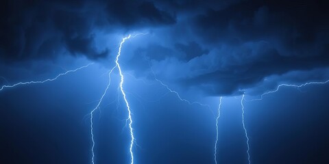 Dynamic electric blue lightning streaks across a dark stormy night sky,  nature,  vibrant