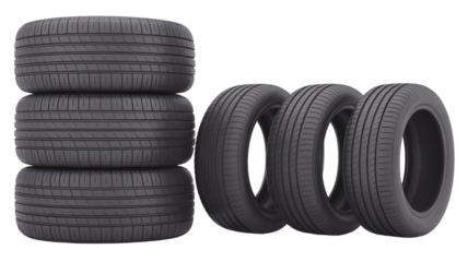 Stacked and Rowed Car Tires on Black Background
