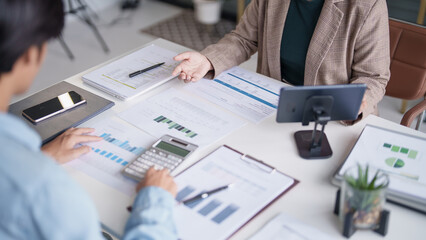 business man Auditor or internal revenue service staff checking annual financial statements company...