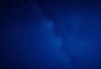 Fototapeta premium Deep blue starry night sky, cosmic dust and nebulae, infinite, stars