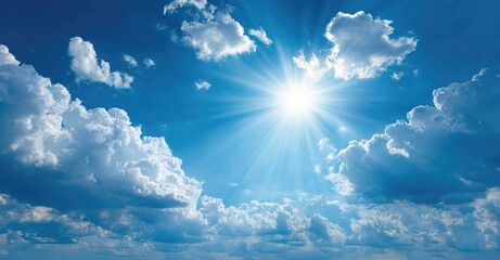 Bright sunbeams pierce a partly cloudy sky