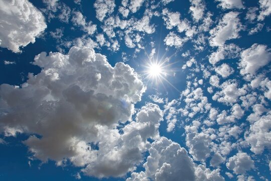 Cloudy sky, sun shining through - Powered by Adobe