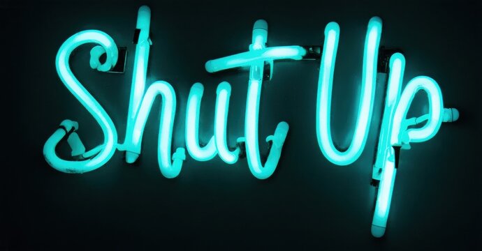 Bright turquoise neon sign displays text Shut Up. Dark background emphasizes glowing script lettering. Simple, direct message. - Powered by Adobe