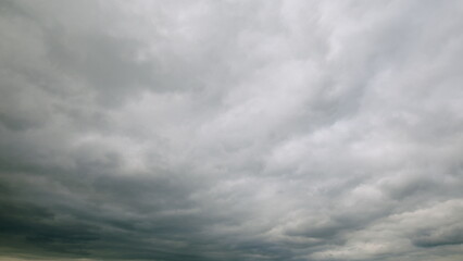 A Moody Overcast Sky Filled with Thick, Heavy Clouds Creating an Ominous Atmosphere