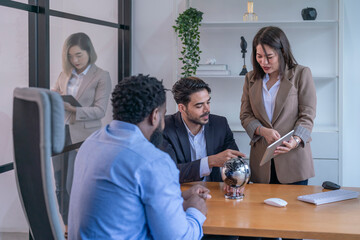 professional business man boss talking and giving advice a female employee in manager room
