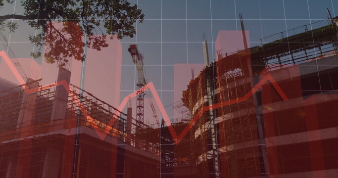 Rising concrete structure at construction site, with scaffolding, tower crane and red data charts