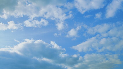 A Serene Sky Filled with Beautiful and Fluffy White Clouds That Are Floating Gracefully