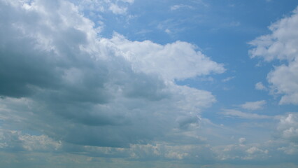Dramatic and striking Cloudy Skies Viewed Over a Striking Bright Blue Background