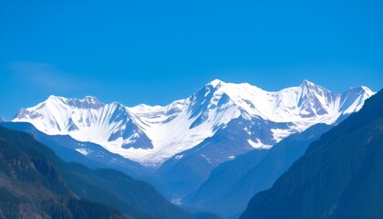 Fototapeta premium A majestic mountain range with snow capped peaks and a clear blu