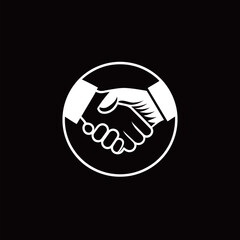 Obraz premium Two hands meet in a handshake, representing a connection or agreement. The black background emphasizes the gesture, highlighting cooperation and partnership.