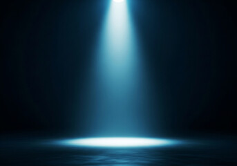 Bright blue spotlight illuminating a dark stage with reflective surface