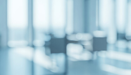 Blurred office interior showing chairs and windows in a light blue tone, reflecting a clean and professional look that feels minimal, modern, and suitable for corporate, creative, or decorative