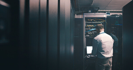 Engineer, technician and laptop with man in server room for hosting database, inspection and...
