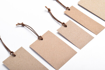 Various shape of blank craft paper label or cloth tag set isolated on white background. Shopping,...